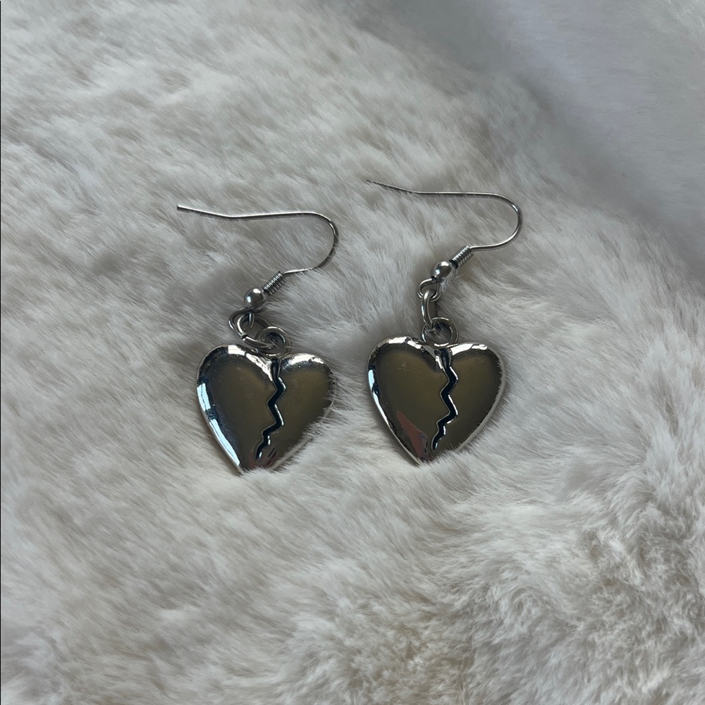 Hot Topic Silver Heart Earrings with Crack Design
